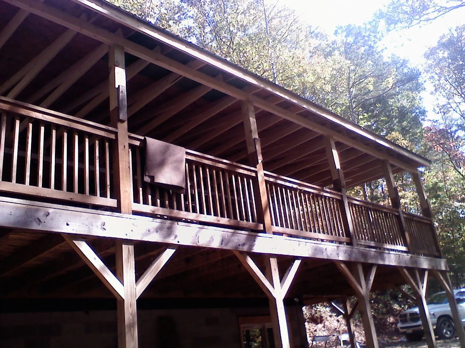 Timber framing under a new elevated porch and deck — Roof Leak Repair in Pewee Valley by Roofing Brothers